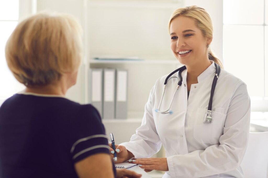 Doctor meeting with a patient to review medical documentation after a personal injury accident.